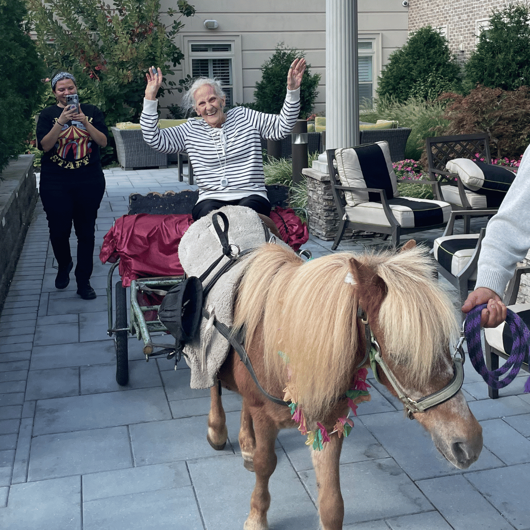 Residents enjoyed the pony ride and petting zoo, highlights of the Grandparents Day Carnival.