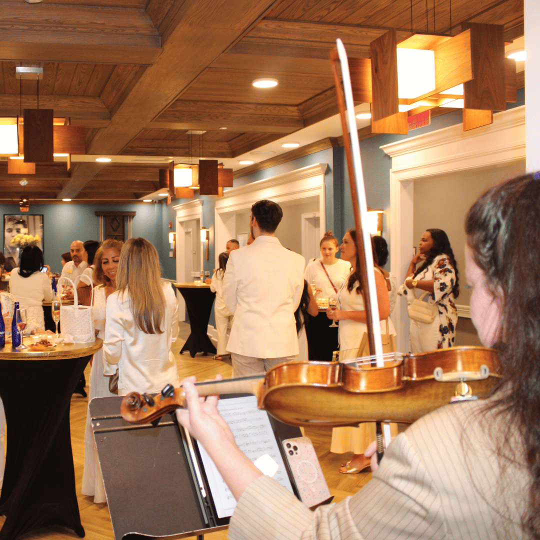 Live entertainment in the form of violin music at the cocktail reception