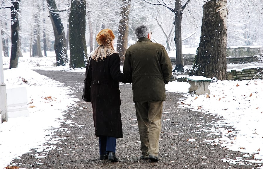 Winter Safety for Seniors: The Bristal Assisted Living - two seniors walk together down a snowy path