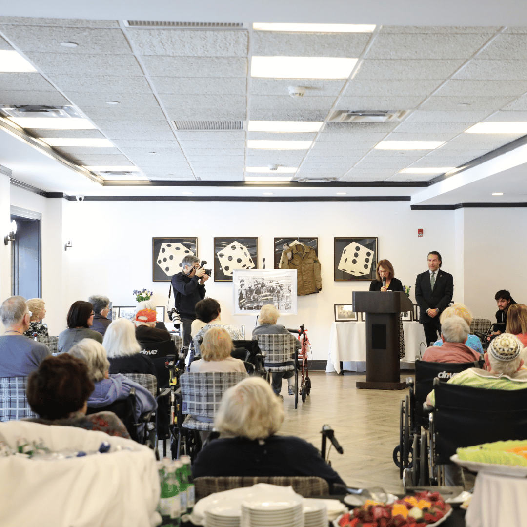 Residents, family members, faith leaders, community leaders, and local politicians gathered for the event at The Bristal