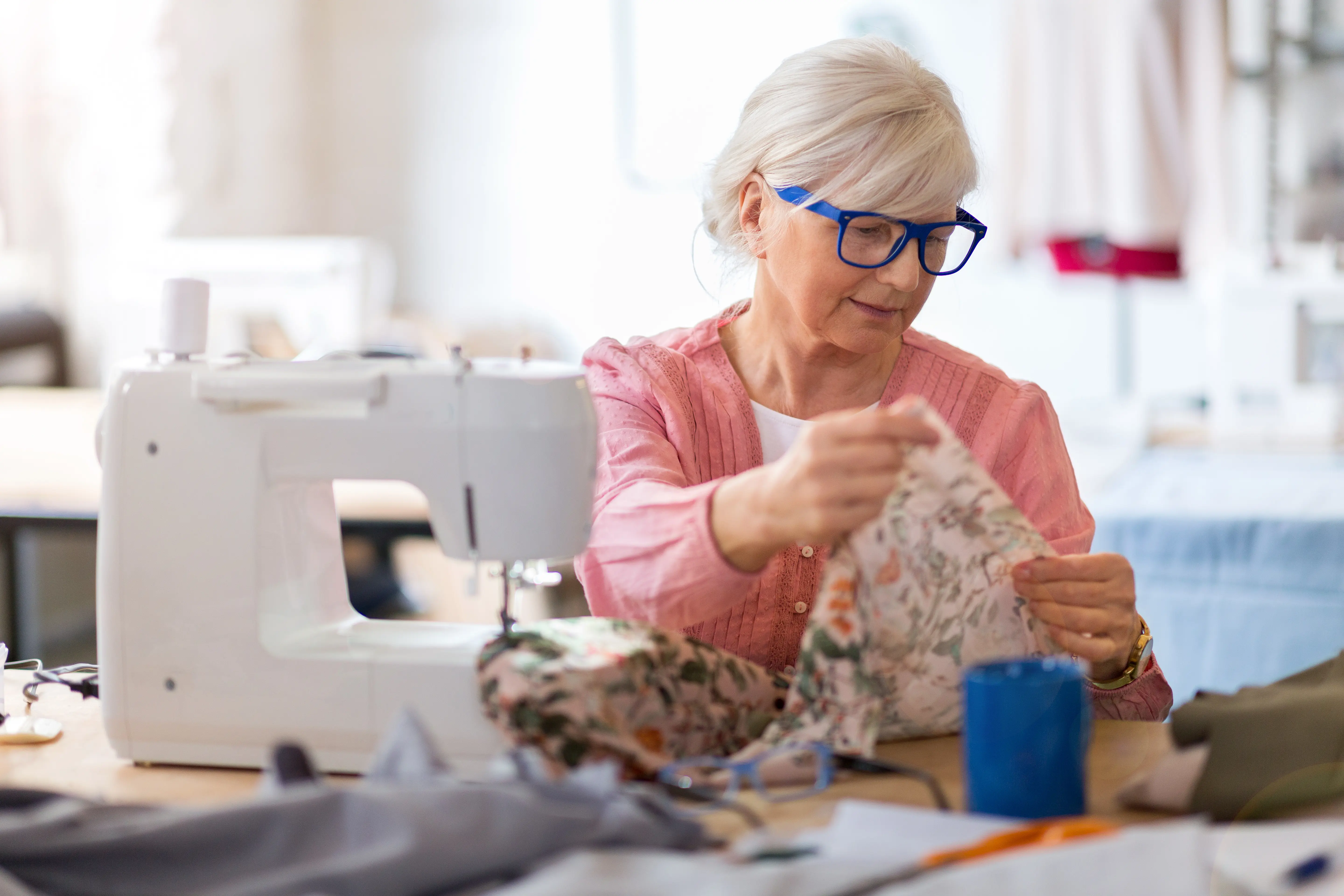 Woman sewing at The Bristal Assisted Living
