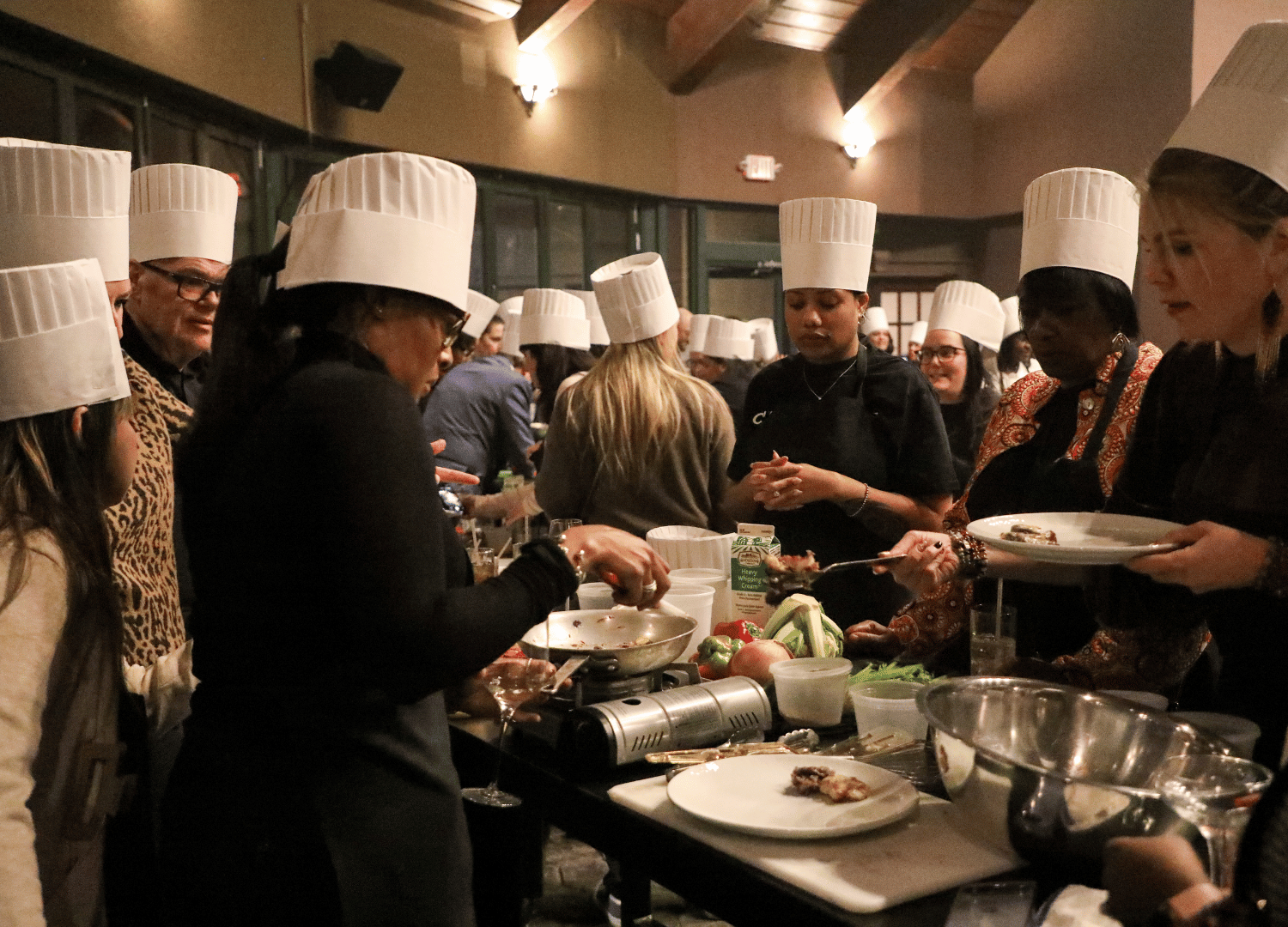 Teams work together to be judged on taste, innovation, creativity, and style at the Iron Chef Competition at the 2026 Leadership Summit for The Bristal Communities